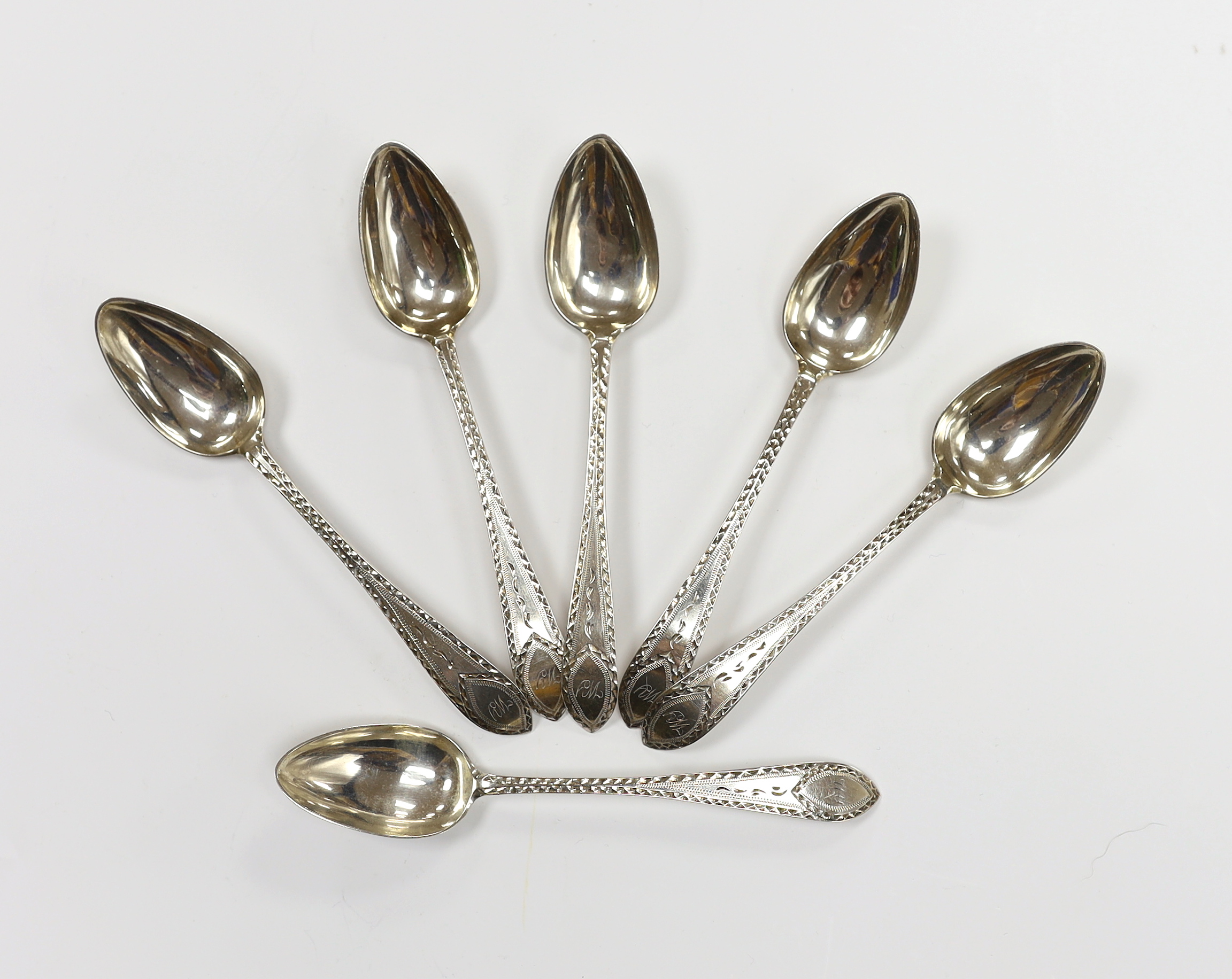 A set of six George III Scottish provincial silver bright cut engraved teaspoons by James Confute, Perth, c.1772-99, 13.6cm.